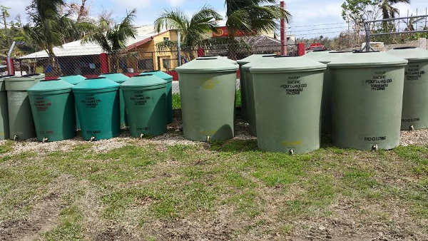 Water Tanks of the kind going to Mele Village, Vanuatu