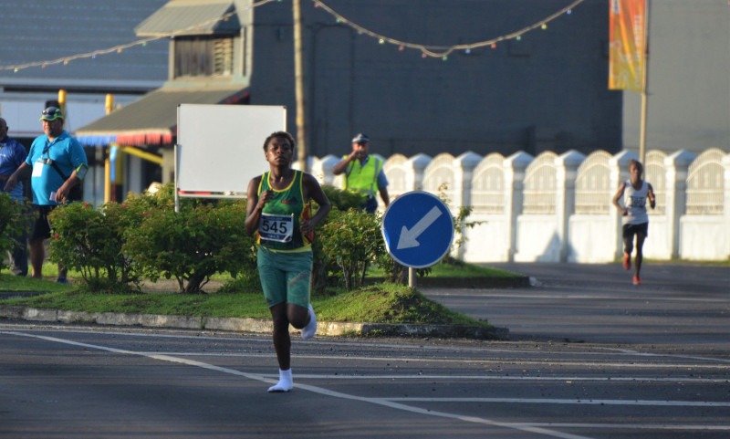 Vanuatu woman wins half-marathon in socks, no shoes